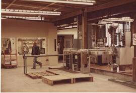 Installing the bottling line. Note the unfinished retail store and Bob McKecknie (engineer and fo...
